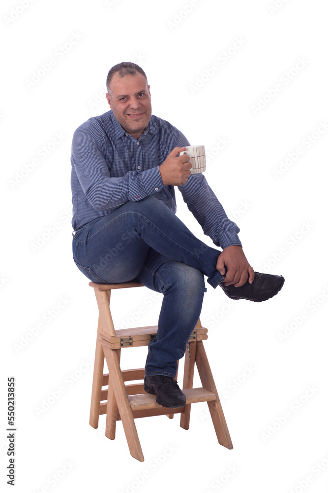 Sitting and holding a cup