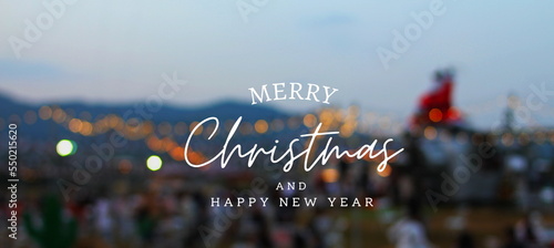 Christmas message There is a blurred background with orange bokeh lights. for background images