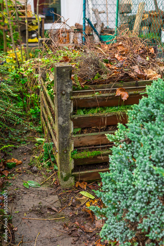 Composter bin in garden - recycling of garden and kitchen waste