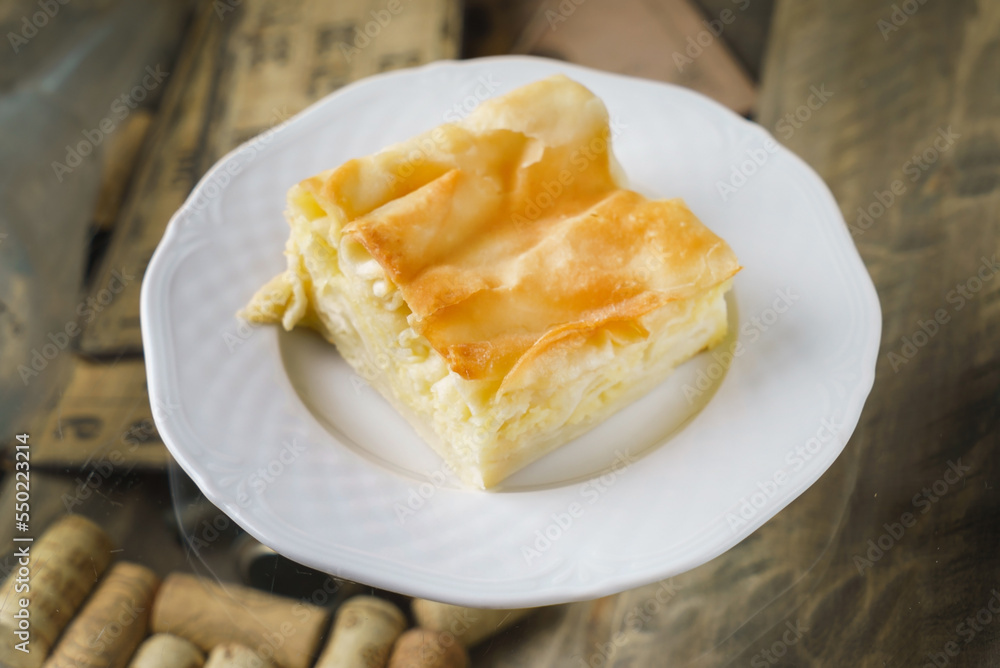 Cheese puff pie from unleavened dough. Georgian cuisine - khachapuri Achma Cheese puff pie from unleavened dough. Georgian cuisine - khachapuri Achma