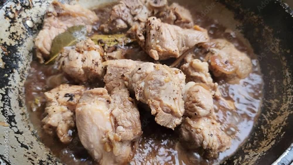 Traditional Filipino Foods - Cooking Pork Adobo and Adding Ingredients 