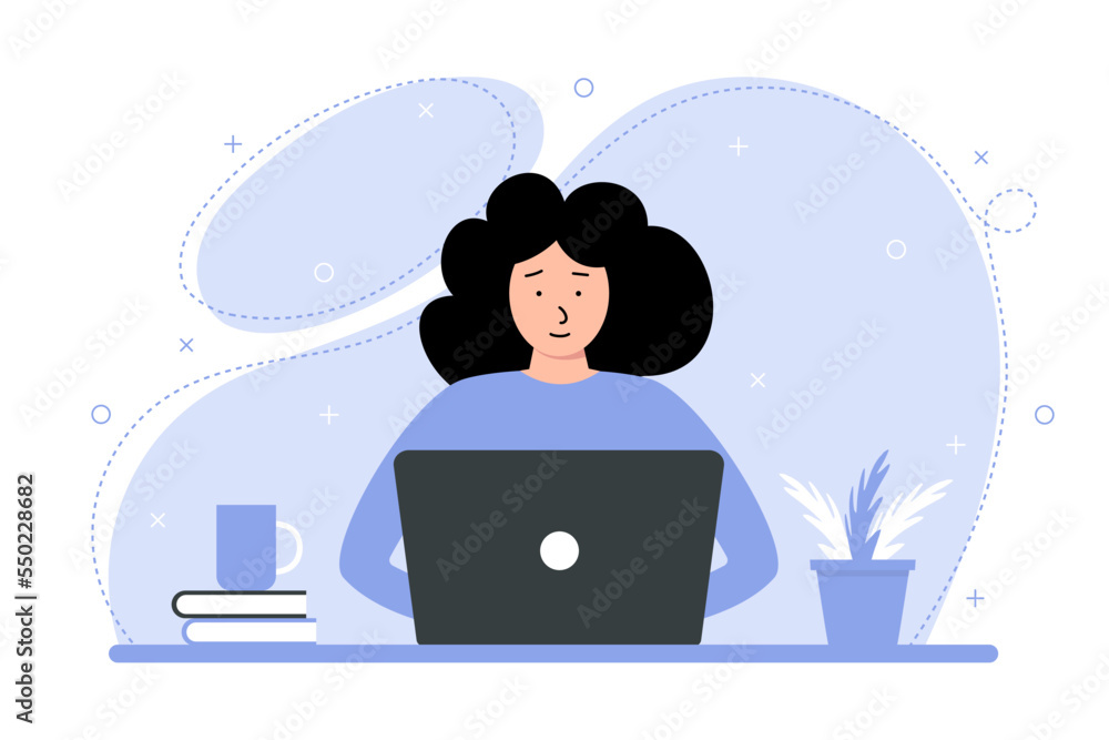 Young female student studies using a laptop. The concept of online learning from home Young female student studies using a laptop. The concept of online learning from home