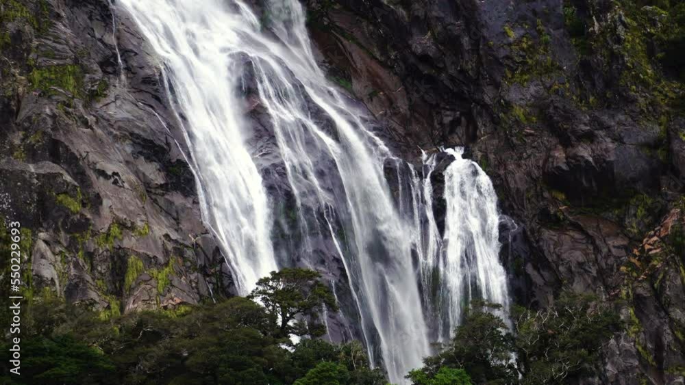 Close up of water flowing down Lady Bowen Falls in Milford Sound, New Zealand Close up of water flowing down Lady Bowen Falls in Milford Sound, New Zealand