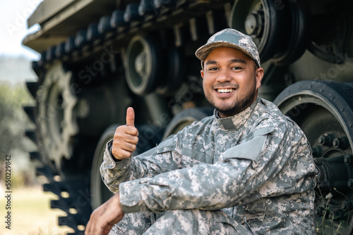 Photos Asian man special forces soldier against on the field Mission