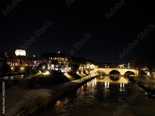 Rome tiberina tiber island view at night photo