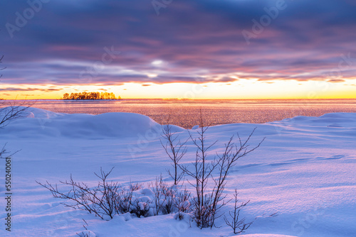Sunset over the frozen sea. F  boda  Finland