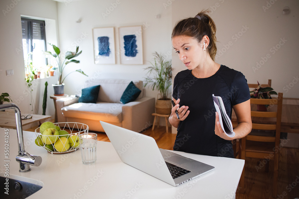 Woman working from home having a video call Woman working from home having a video call