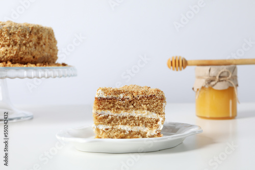 Concept of tasty sweets, delicious honey cake