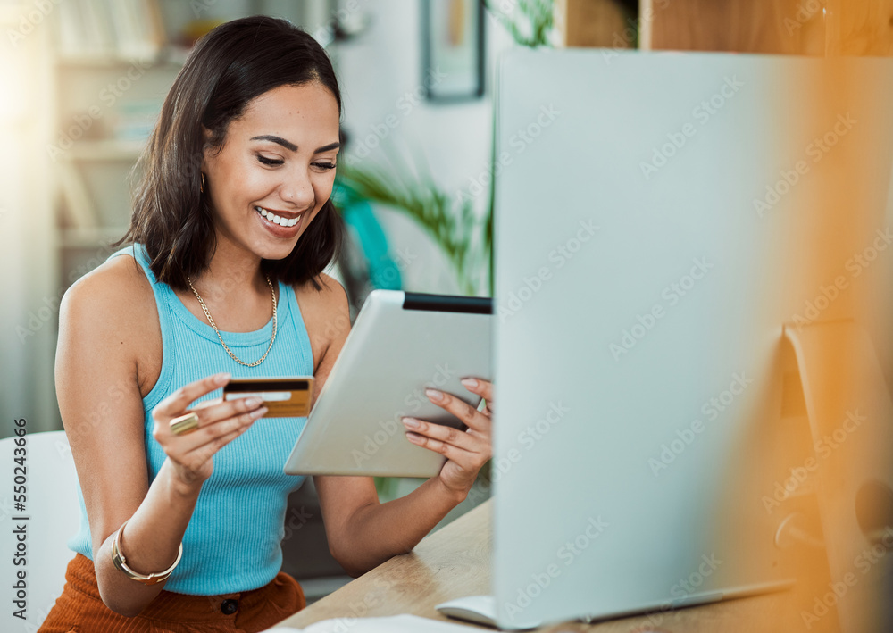 Online shopping with credit card and tablet while paying for her streaming subscription or bill. Happy woman enjoy break and online shopping or purchasing items on eCommerce website with fintech app Online shopping with credit card and tablet while paying for her streaming subscription or bill. Happy woman enjoy break and online shopping or purchasing items on eCommerce website with fintech app