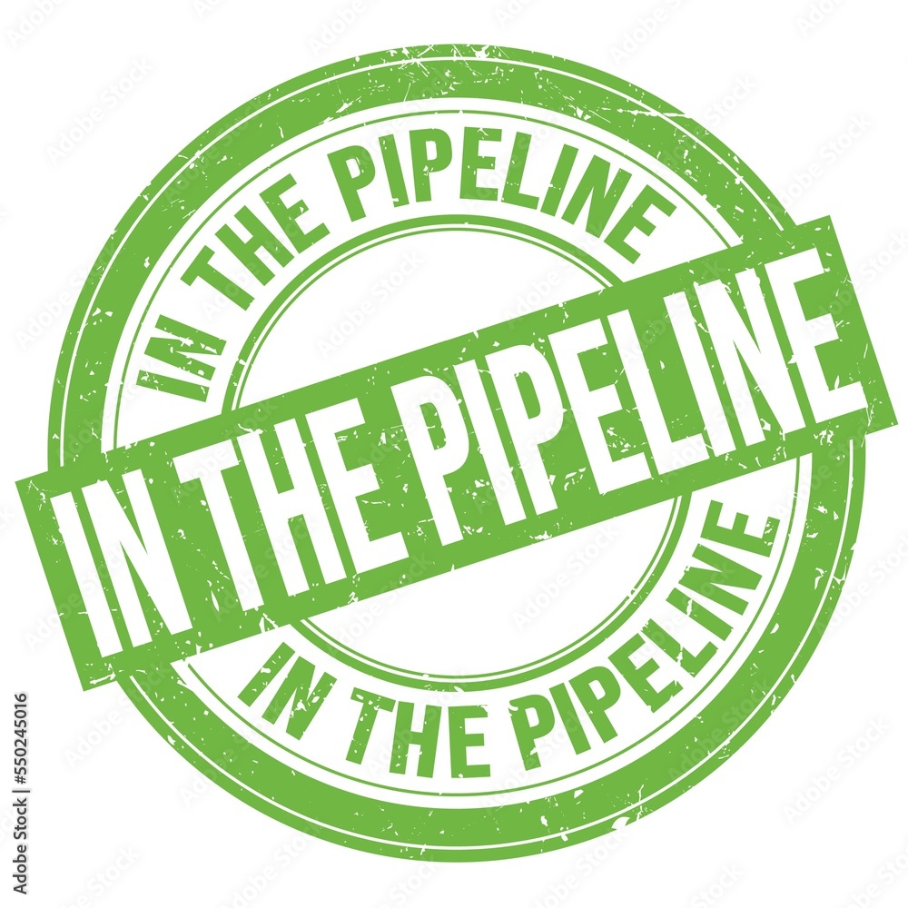 IN THE PIPELINE text written on green round stamp sign IN THE PIPELINE text written on green round stamp sign