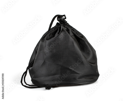 Black drawstring bag packaging isolated over white background