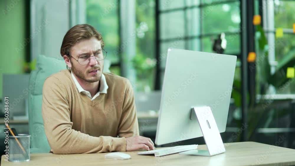 Sick young business man office worker with glasses suffering from stomach gastritis ache feeling bad at modern workplace Unhealthy employee holding belly with indigestion or poisoning at desk indoor Sick young business man office worker with glasses suffering from stomach gastritis ache feeling bad at modern workplace Unhealthy employee holding belly with indigestion or poisoning at desk indoor