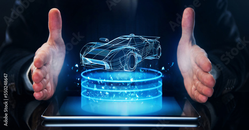 ?oncept Development design and sales in the automotive industry. Engineer demonstrates the concept of a new car to investors.