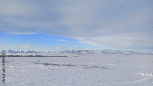 Winter arctic landscape with mountains in the background © alopsik