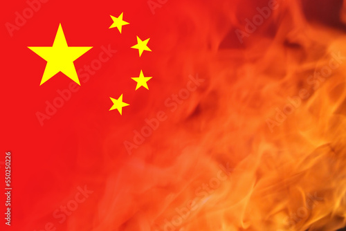 Protests China flag. Chinese real estate and debt crisis. Zero covid and lockdown protest in China. Revolution demonstration. Communism. Kill protesters. Economy. Fire flame