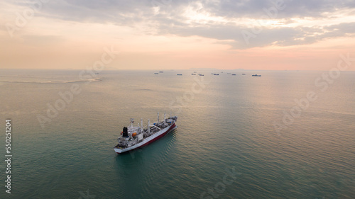 ship sailing in sea at evening sky aerial view © SHUTTER DIN