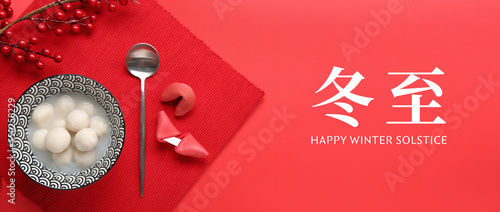 Greeting card for Chinese Dongzhi festival (Winetr Solstice) with tasty tangyuan on red background photo
