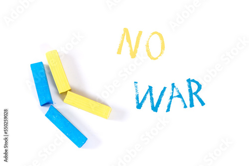 stop the war in ukraine written with colored chalks