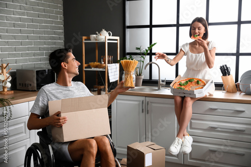 Young woman with pizza and ...