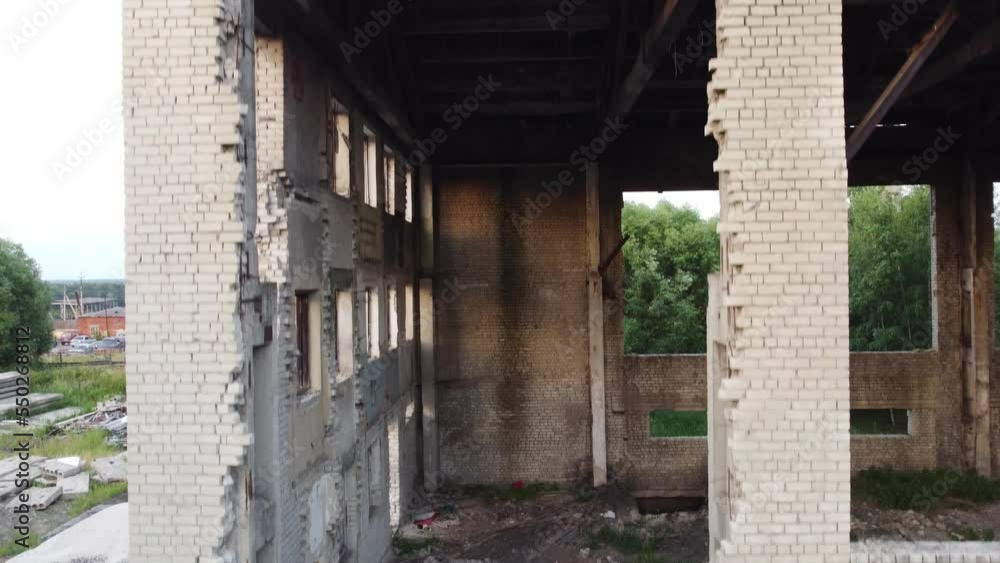 ruined building view from quadcopter. old brick building destroyed