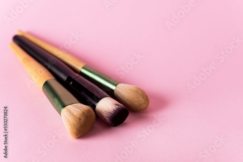 Set of Makeup Brushes on Pink Background Minimal Flat Lay Copy Space