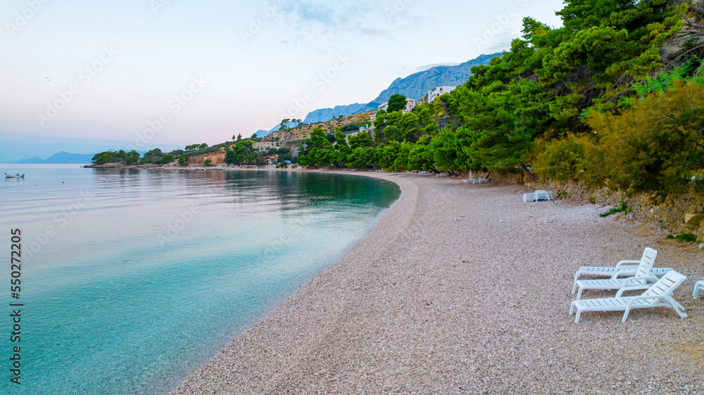 Croatia beach travel blue sea and green pine trees on the Adriatic coast in Croatia Croatia beach travel blue sea and green pine trees on the Adriatic coast in Croatia
