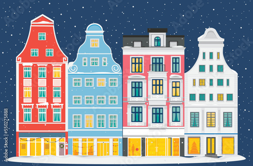 An evening winter street block with historic gabled houses along the Kroepeliner Strasse in Rostock.