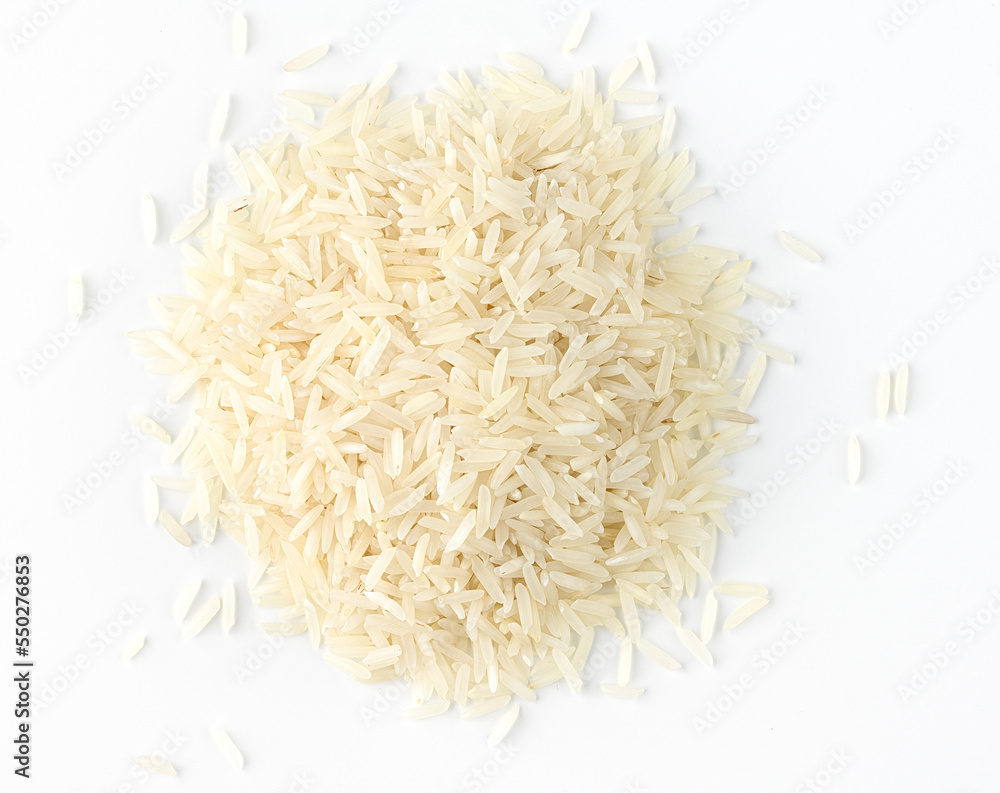 Dry white long rice basmati pile on a white background. Directry above