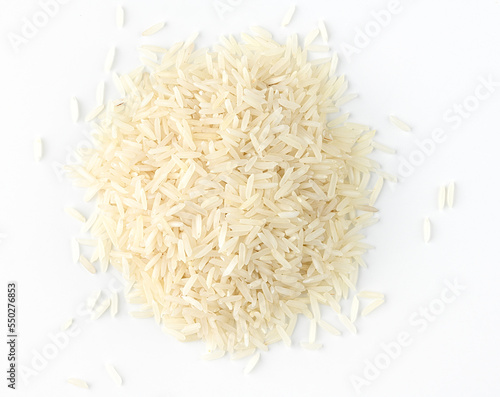 Dry white long rice basmati pile on a white background. Directry above