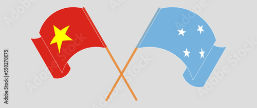 Crossed and waving flags of Vietnam and Micronesia