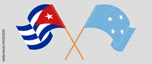 Crossed and waving flags of Cuba and Micronesia