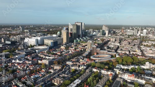 Den Haag Holland Spoort train station, Rode Dorp, China town, Stationsbuurt, Rivierenbuurt and skyline of the Hague in The Netherlands, south Holland. Aerial drone view. photo
