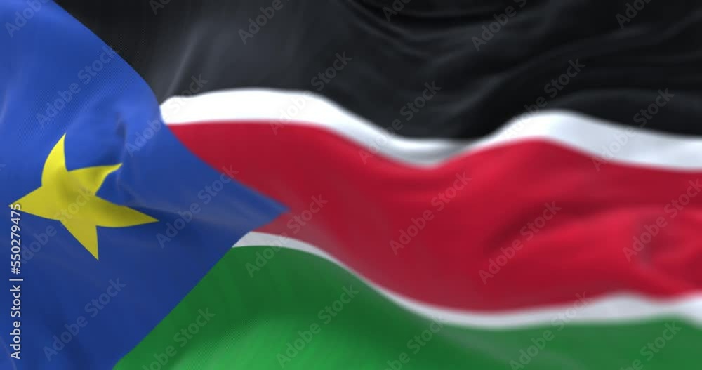 Close-up view of the South Sudan national flag waving in the wind Close-up view of the South Sudan national flag waving in the wind