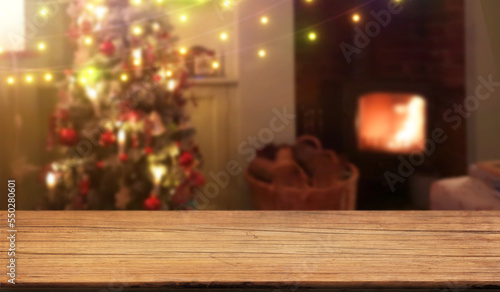 christmas tree and fireplace  wood table background  blur bokeh texture wallpaper