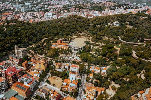 Photography Aerial shot over the buildings of Barcelona and historic places on a sunny summe