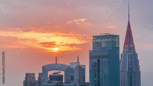 Sunset over financial center of Dubai city with luxury skyscrapers timelapse, Dubai, United Arab Emirates