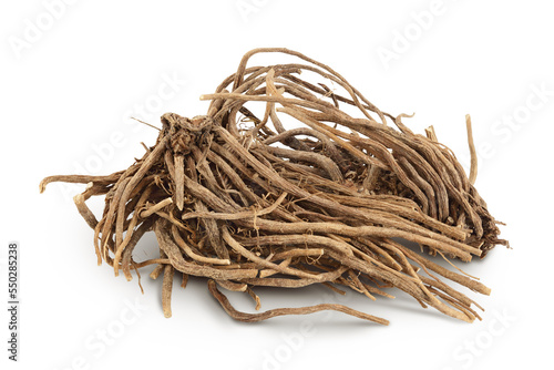 Dried Valerian root isolated on white background. Valeriana officinalis with full depth of field.