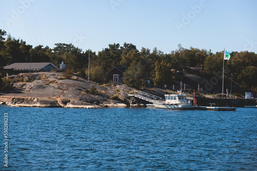 Archipelago National Park landscape, Southwest Finland, with islands, islets and skerries, Saaristomeren kansallispuisto, summer sunny day, view from shuttle ship ferry boat in the Archipelago Sea © tsuguliev