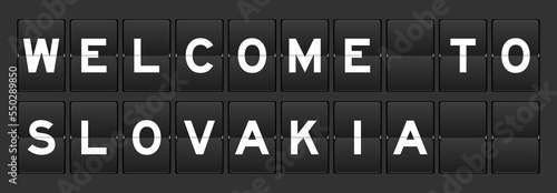 Photography Black color analog flip board with word welcome to slovakia on gray background