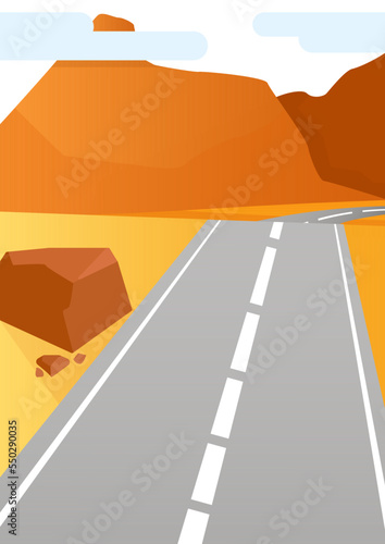 Vászonkép A gray roadbed goes along an orange hill next to large stones and mountains in t