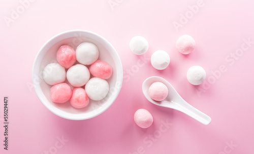 Canvas Print Tang Yuan(sweet dumplings balls), a traditional cuisine for Mid-autumn, Dongzhi (winter solstice ) and Chinese new year food on pastel background