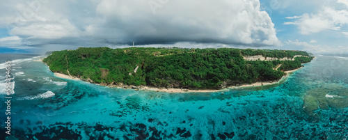 Panorama of Bali coastline with turquoise ocean and beaches. Aerial view