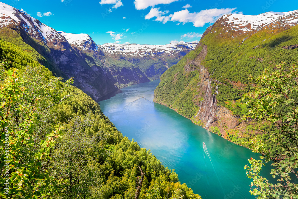 Peaceful Geirangerfjord with boat and waterfall, Norway , Scandinavia