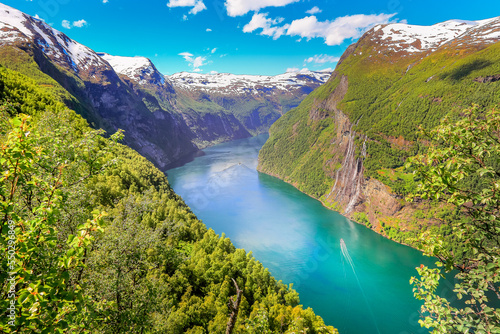 Peaceful Geirangerfjord with boat and waterfall, Norway , Scandinavia photo