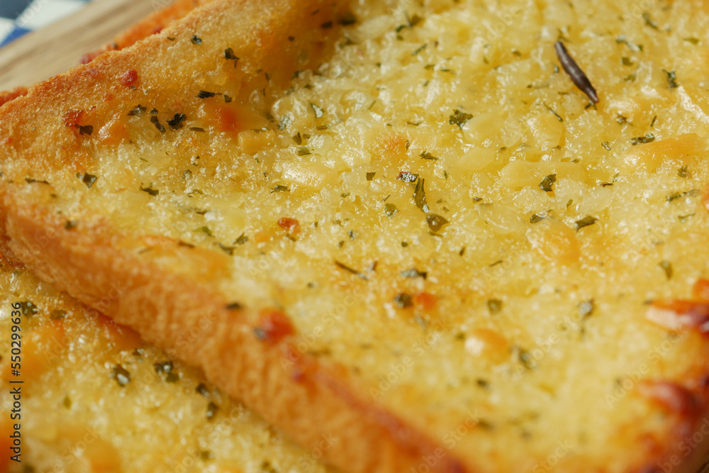 garlic bread on a plate on table garlic bread on a plate on table