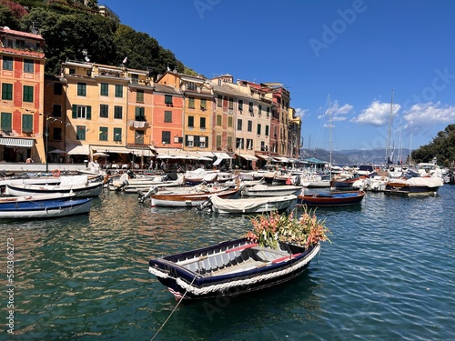 Portofino, Italy - July 8th, 2022: The beautiful Portofino with colorful houses and boats in little bay harbor. Liguria, Italy, Europe