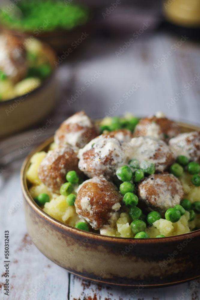 Swedish meatballs with mashed potato side dish - typical dish of Swedish cuisine Swedish meatballs with mashed potato side dish - typical dish of Swedish cuisine