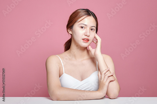 Portrait of beautiful asian woman with young clean healthy skin, studio shot isolated background. Anti-aging and beauty facial treatment.