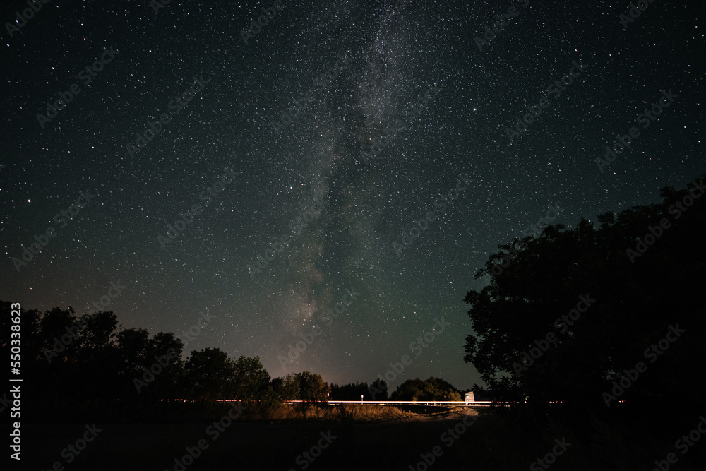 the starry sky and the milky way in the field