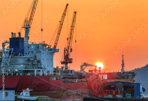 the sunset of the shipyard's workshop under construction